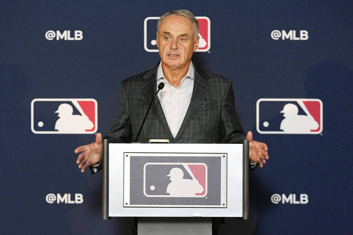 Major League Baseball commissioner Rob Manfred speaks during a news conference after an owners ...