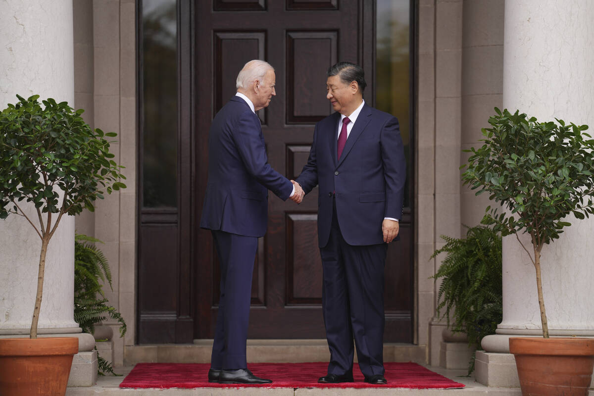 President Joe Biden greets China's President President Xi Jinping at the Filoli Estate in Woods ...