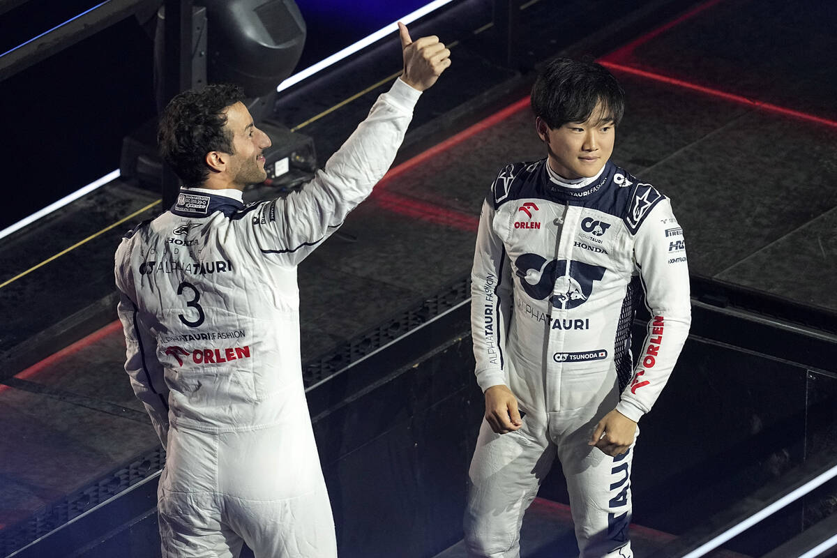 AlphaTauri driver Daniel Ricciardo, of Australia, left, and AlphaTauri driver Yuki Tsunoda, of ...