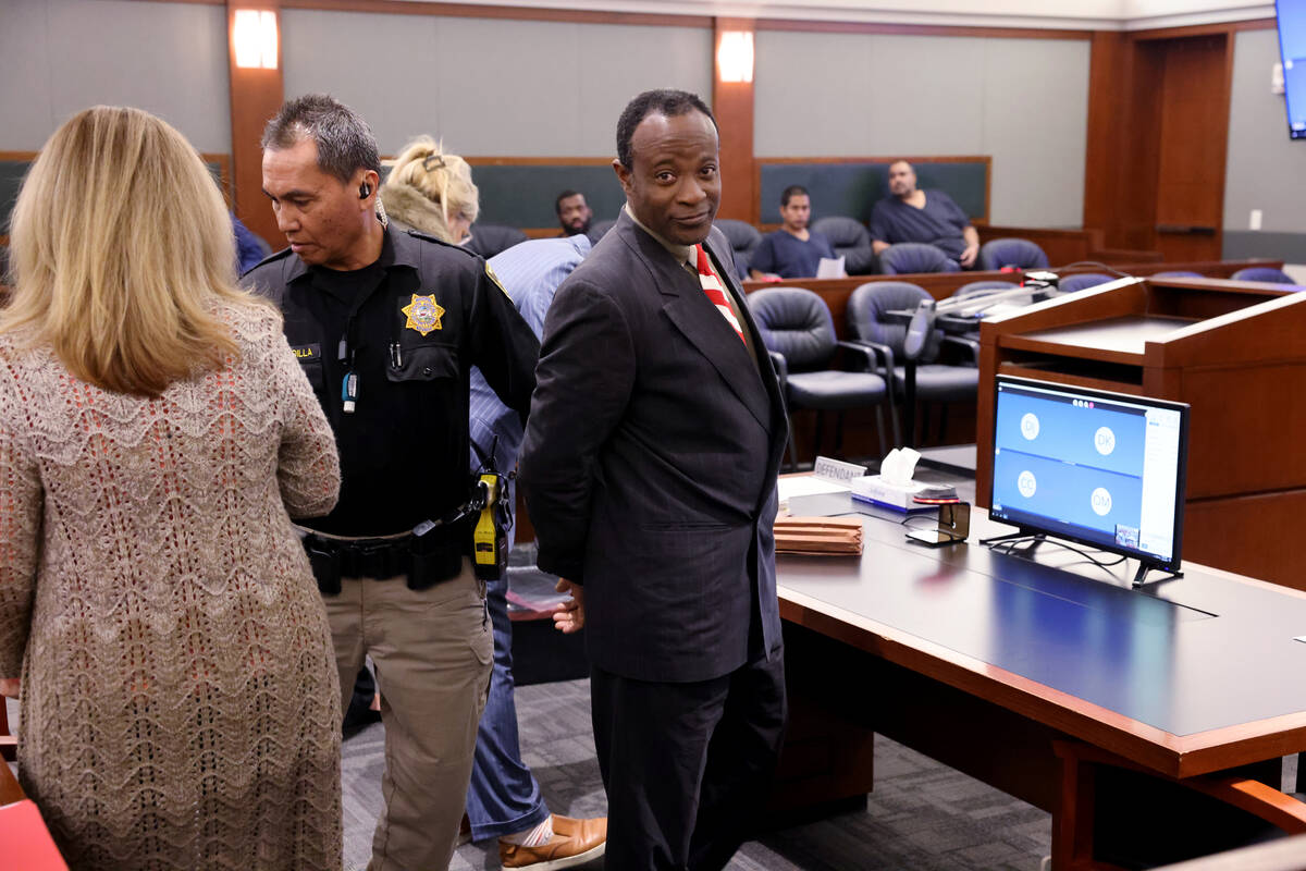 Arrold Geffrard Jean is taken into custody during his sentencing hearing at the Regional Justic ...