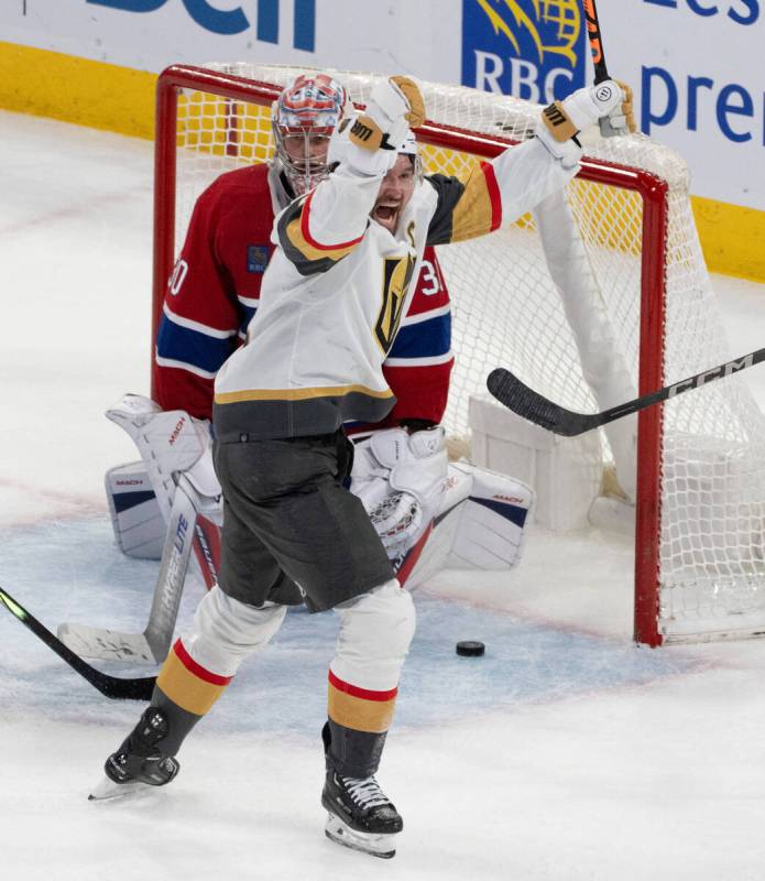 Vegas Golden Knights' Mark Stone (61) celebrates a goal on Montreal Canadiens goaltender Cayden ...