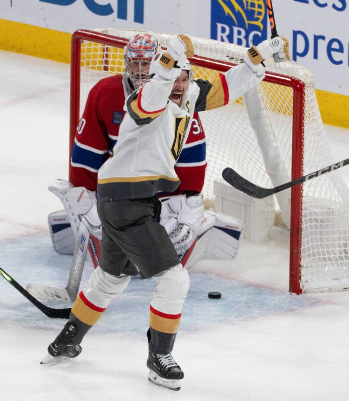 Vegas Golden Knights' Mark Stone (61) celebrates a goal on Montreal Canadiens goaltender Cayden ...