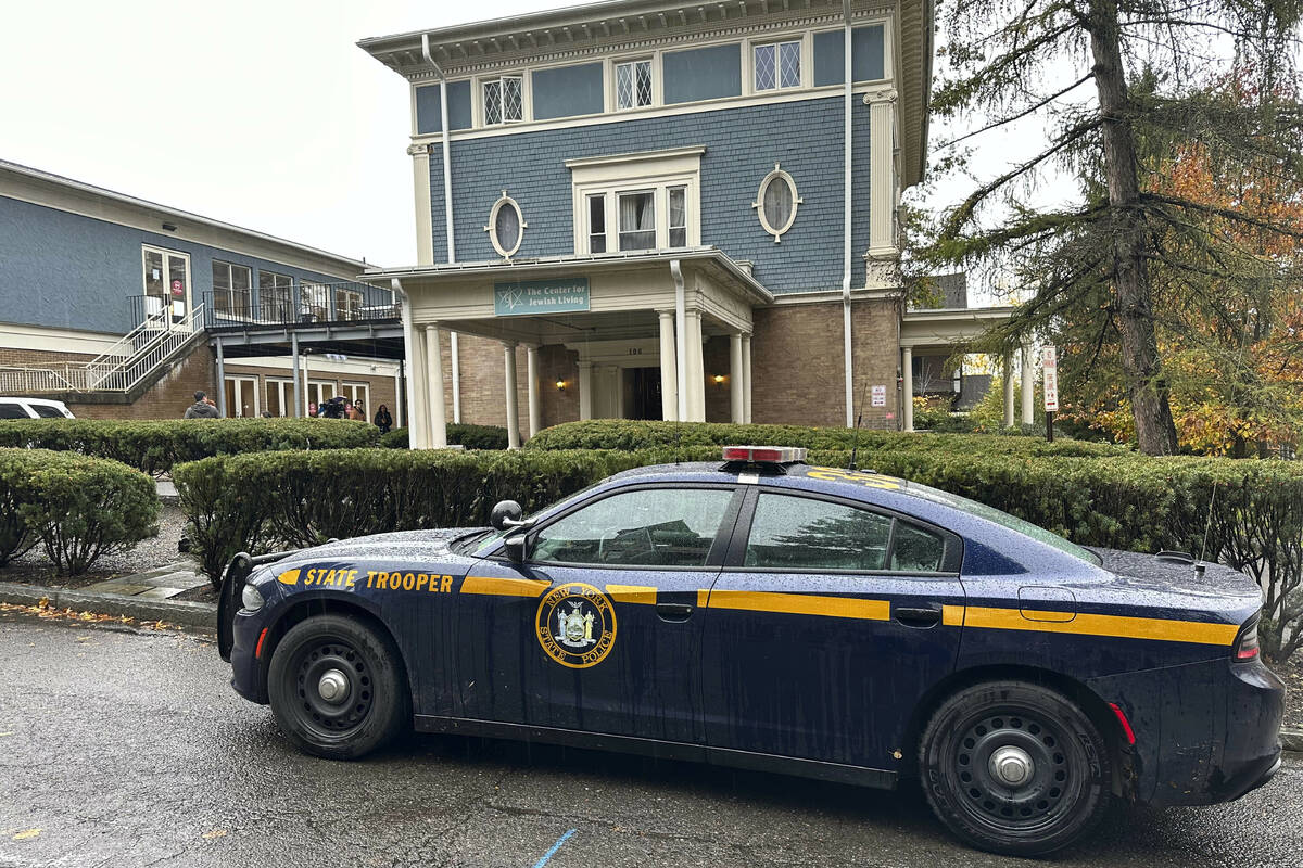 FILE - A New York State Police Department cruiser is parked in front of Cornell University's Ce ...