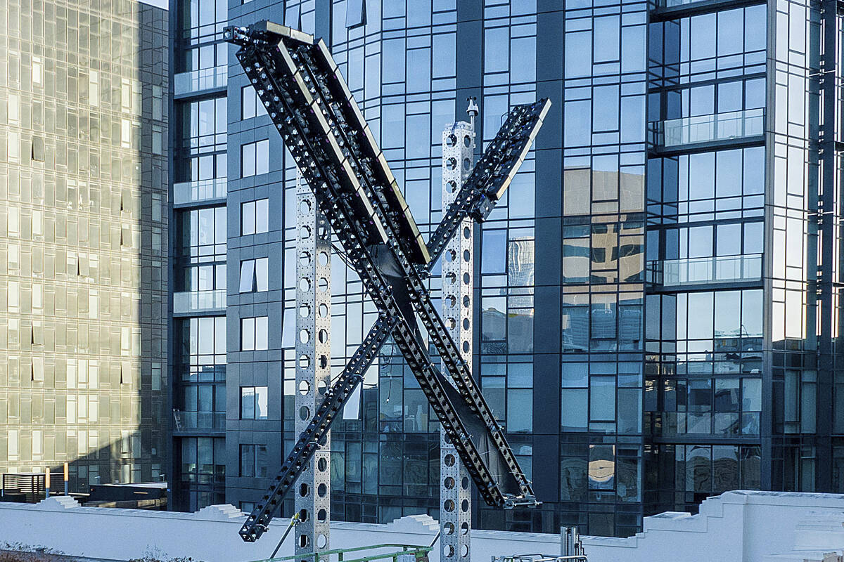 An "X" sign sits atop the social media platform's headquarters, in San Francisco, on July 28, 2 ...