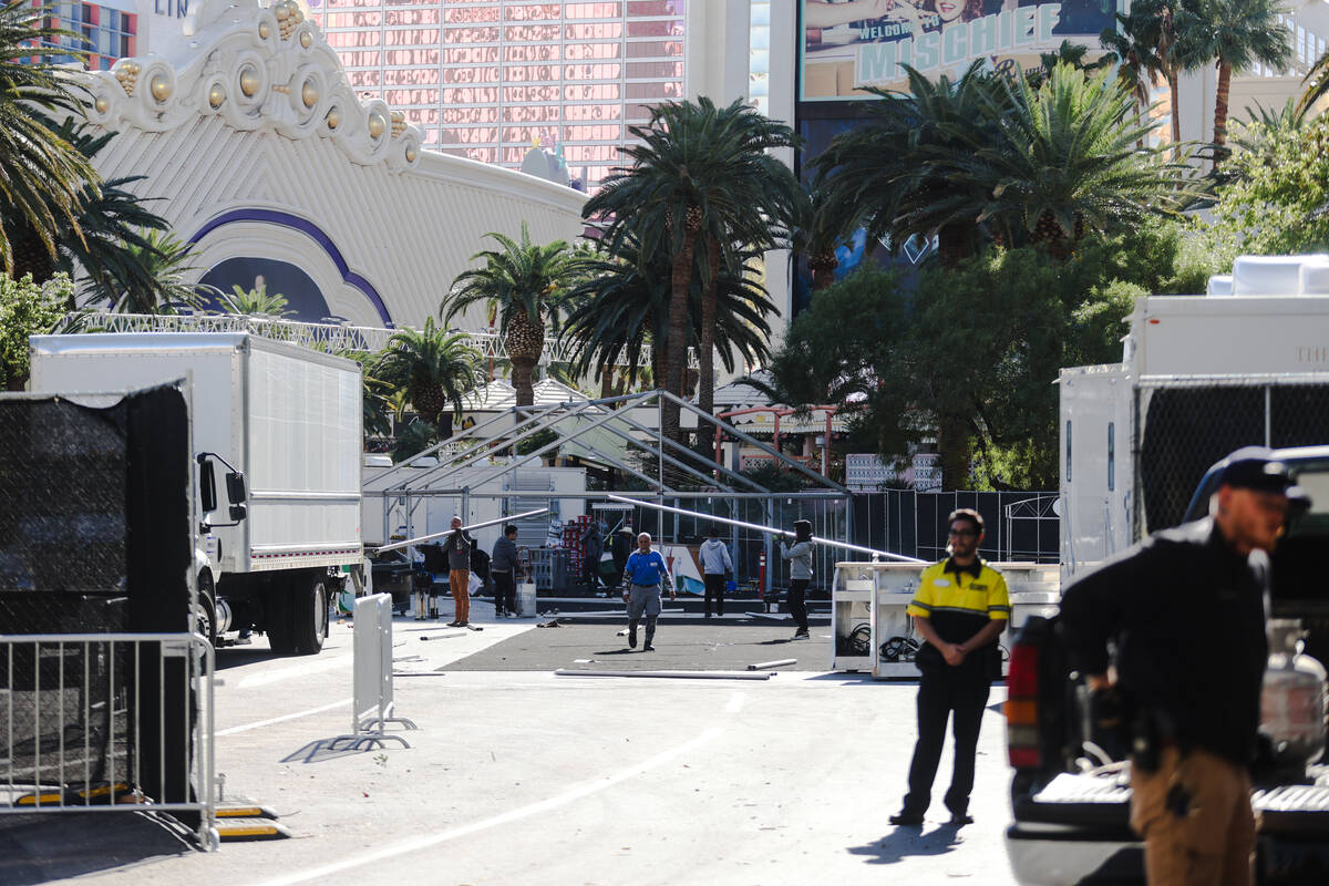 Workers disassemble a pop-up area that was for entertaining guests of the Formula 1 Las Vegas G ...