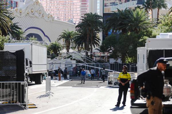 Workers disassemble a pop-up area that was for entertaining guests of the Formula 1 Las Vegas G ...