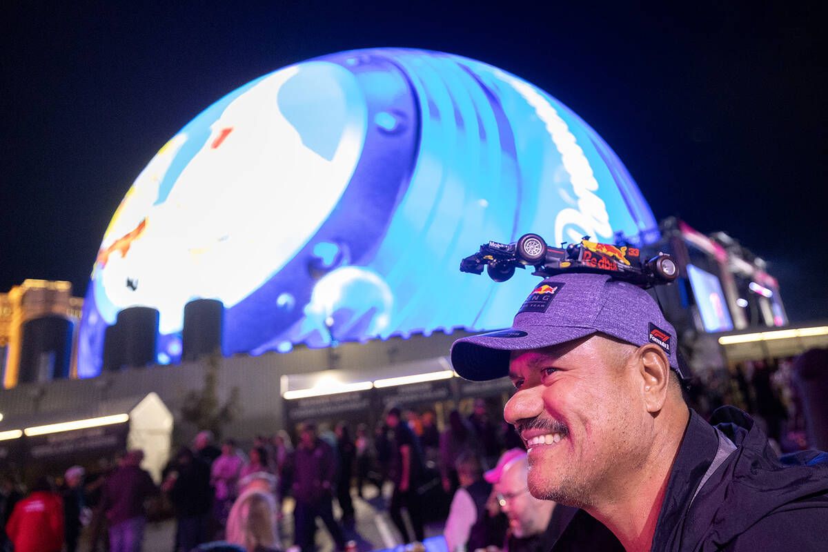 Victor Navarro, of California, wears a Red Bull car atop his hat before the Formula One Las Veg ...