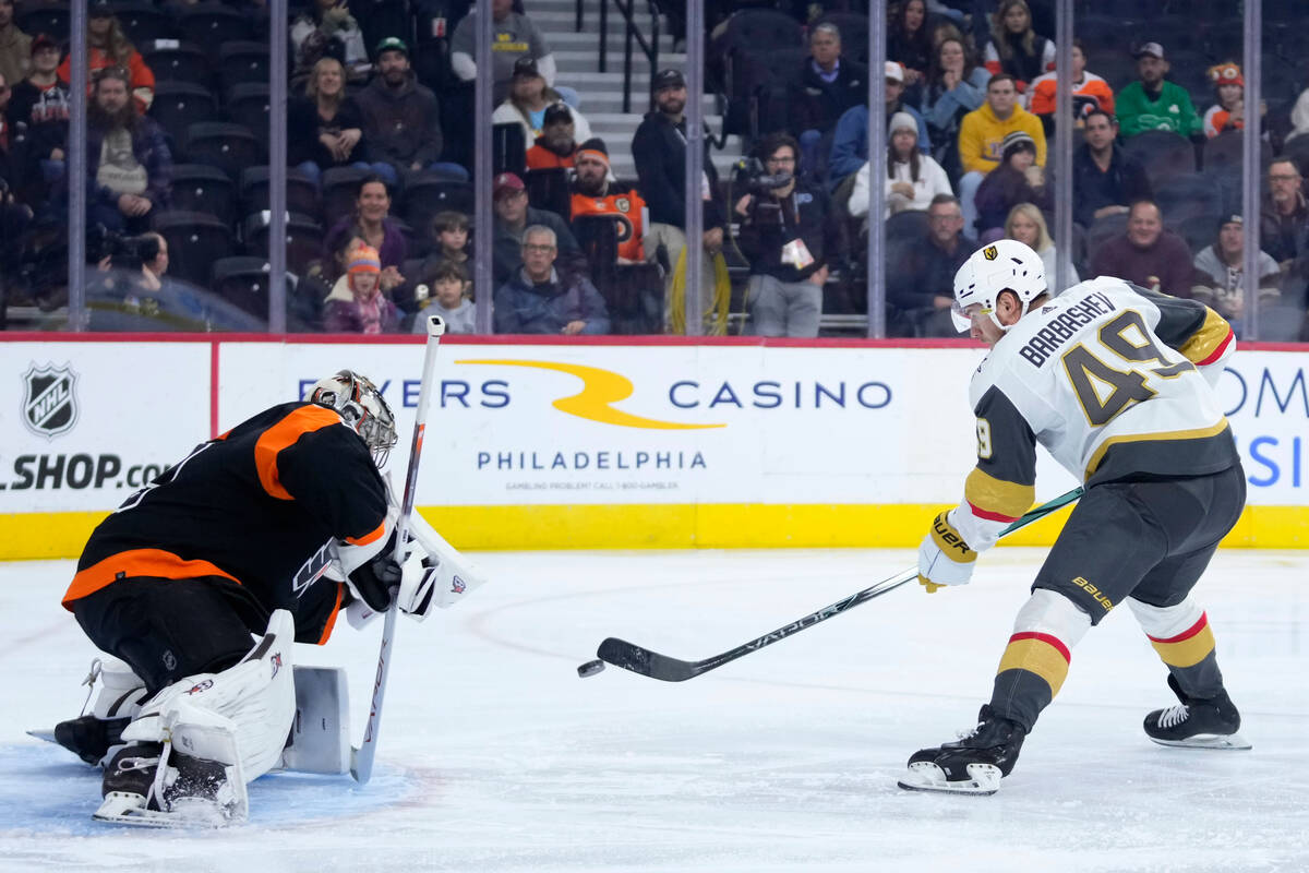 Vegas Golden Knights' Ivan Barbashev, right, cannot get a shot past Philadelphia Flyers' Carter ...