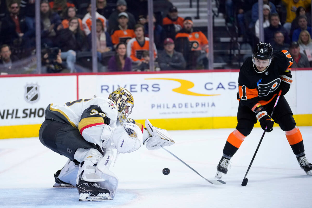 Vegas Golden Knights' Logan Thompson, left, cannot stop the game-winning goal by Philadelphia F ...