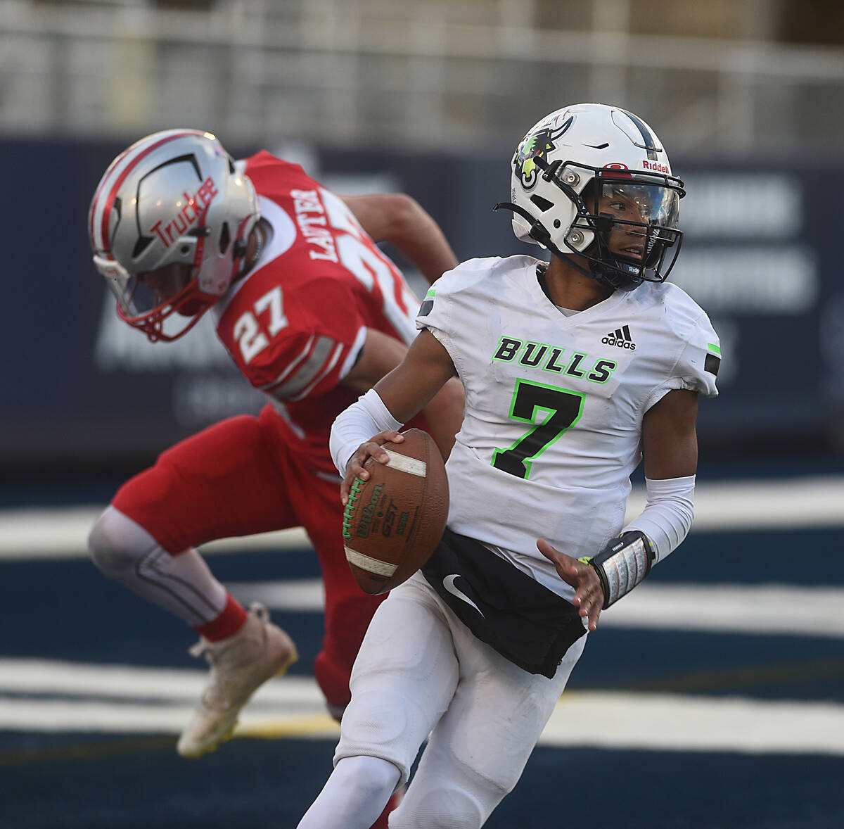 SLAM Academy's Alaijah Young looks to pass against Truckee in the Class 3A football state champ ...