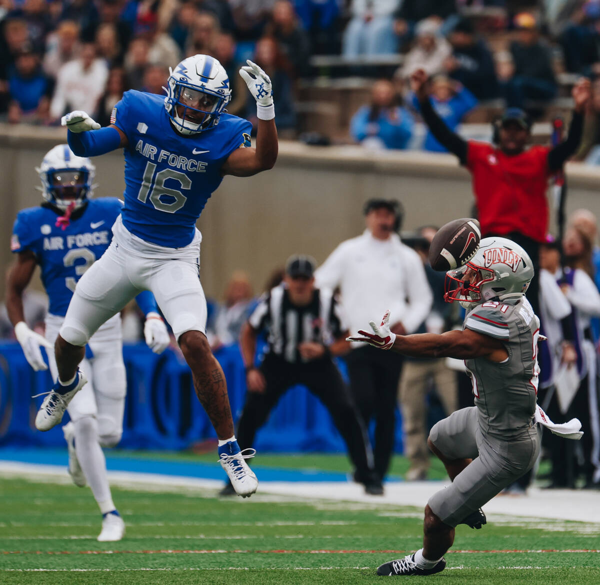 UNLV wide receiver Jacob De Jesus (21) fails to catch the ball as Air Force Falcons safety Jayd ...