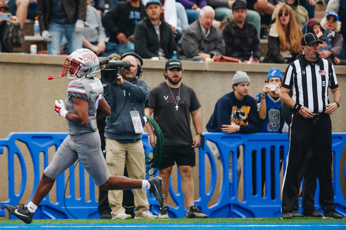 UNLV running back Vincent Davis Jr. (5) runs into the end zone for a touchdown during a game ag ...