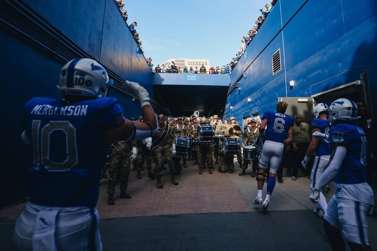 The Air Force marching band hypes up Air Force football players before a game against UNLV at F ...