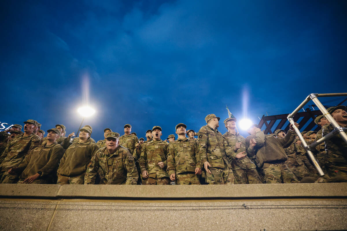 Air Force cadets cheer for their team during a game against UNLV at Falcon Stadium on Saturday, ...