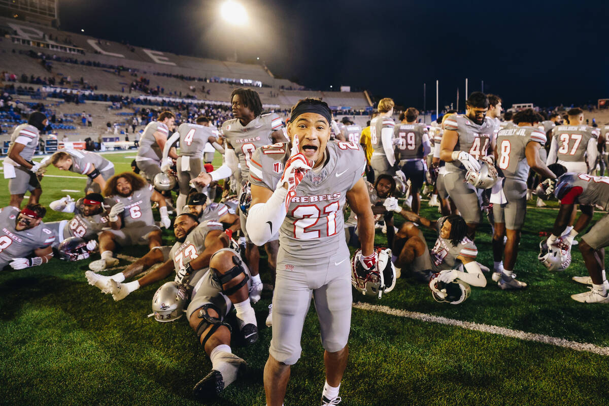 UNLV wide receiver Jacob De Jesus (21) celebrates beating Air Force at Falcon Stadium on Saturd ...