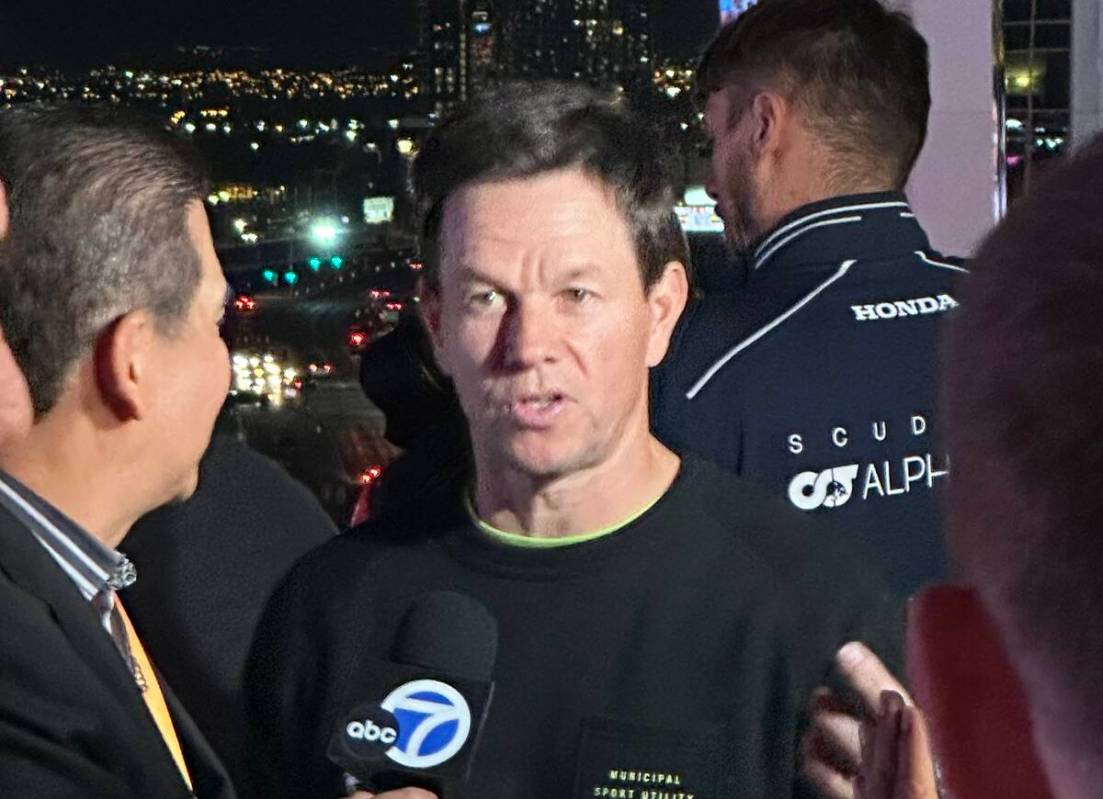 A-list actor Mark Wahlberg is shown at the McLaren Vista F1 viewing party on the VIP pool deck ...