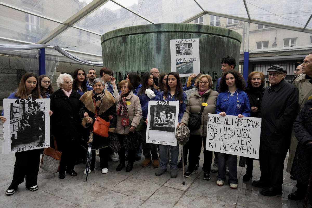 French nazi hunter Serge Klarsfeld, right, his wife Beata, second from right, French Holocaust ...