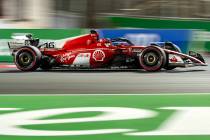 Ferrari driver Charles Leclerc rounds turn 1 during the qualifying session on the second night ...