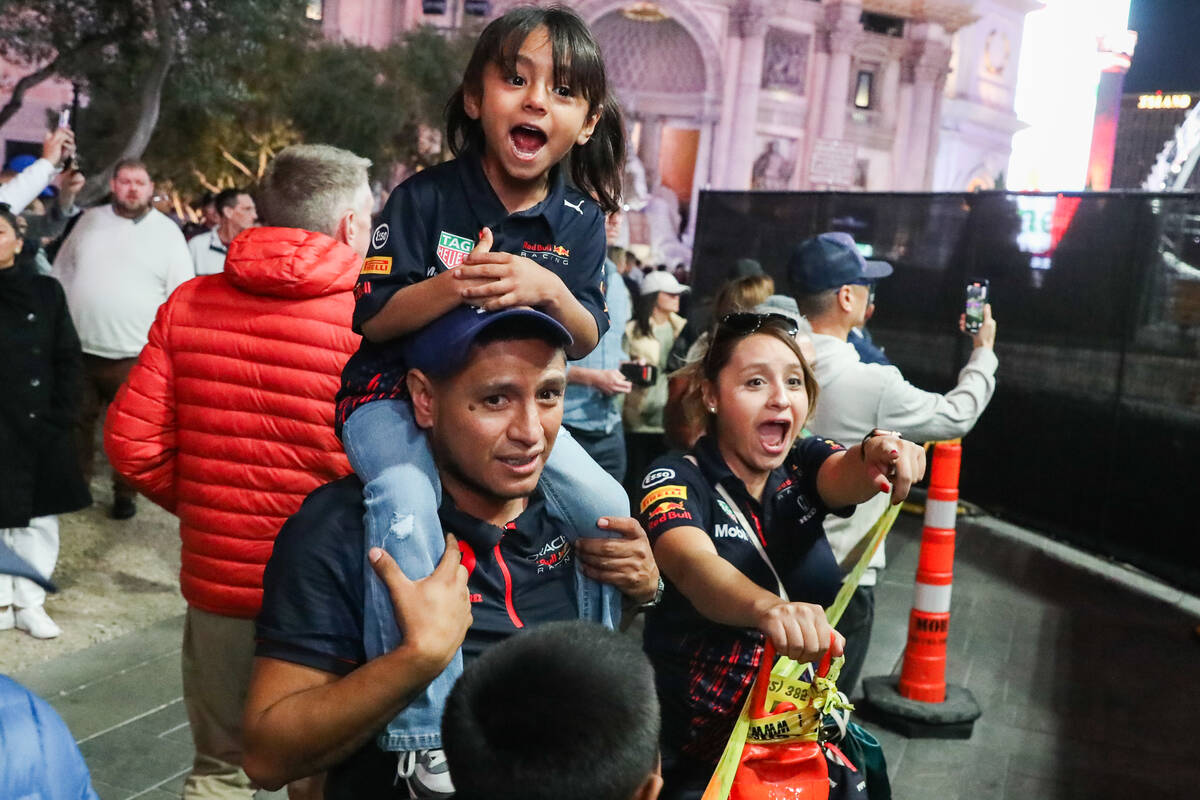 Excited fans watch the final Formula 1 Las Vegas Grand Prix race on Sunday, Nov. 19, 2023 in La ...