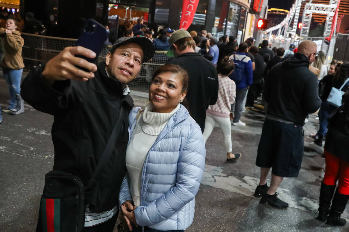 Excited fans take a selfie prior to the final Formula 1 Las Vegas Grand Prix race on Sunday, No ...