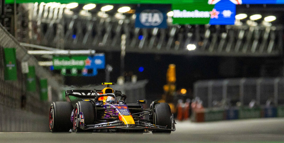 Red Bull Racing driver Sergio Perez comes into turn one from the front straightaway during the ...