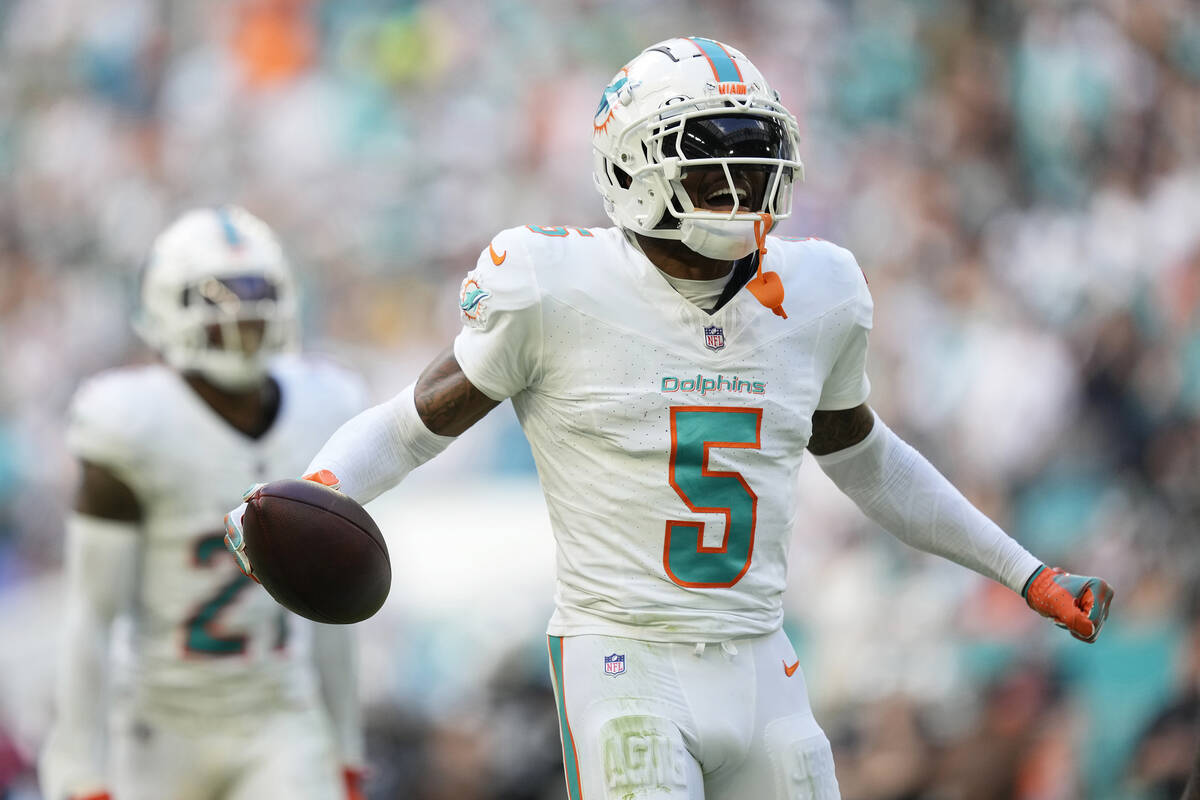 Miami Dolphins cornerback Jalen Ramsey (5) celebrates after intercepting a pass thrown by Las V ...