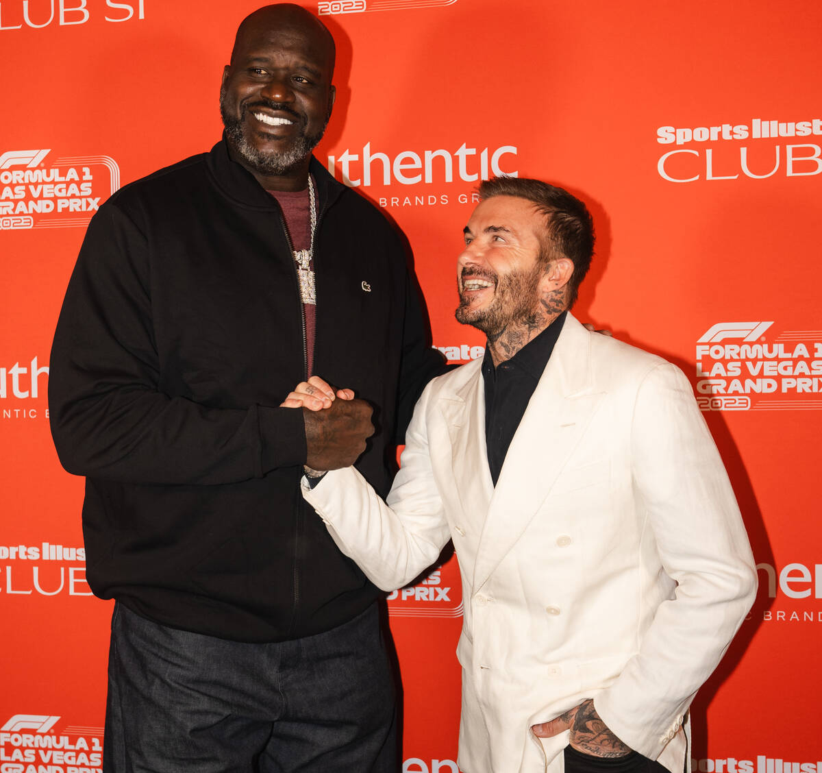 Shaquille O'Neal, left, and David Beckham hit the red carpet at Sports Illustrated's Club SI in ...