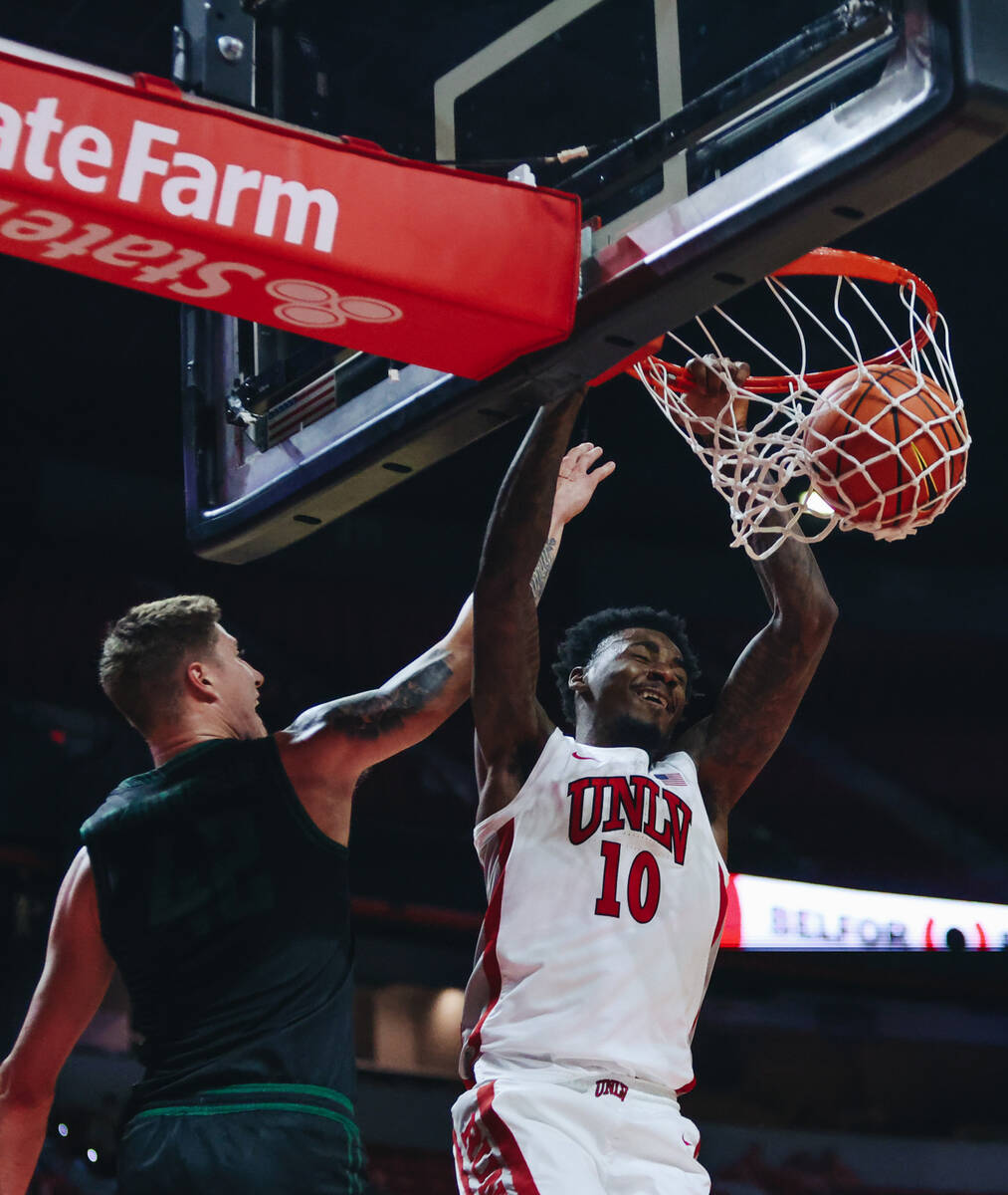 UNLV forward Kalib Boone (10) reacts to making a basket during a game against Stetson at Thomas ...