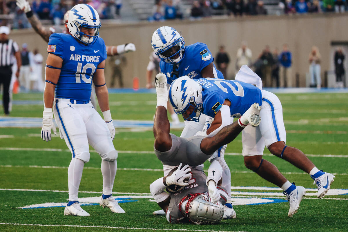 UNLV defensive back Kris Williams (17) lands on his head during a play in a game against Air Fo ...