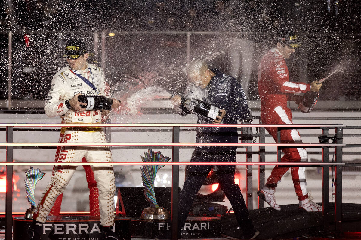 Red Bull Racing driver Max Verstappen, left, Alpine driver Esteban Ocon and Red Bull Racing dri ...