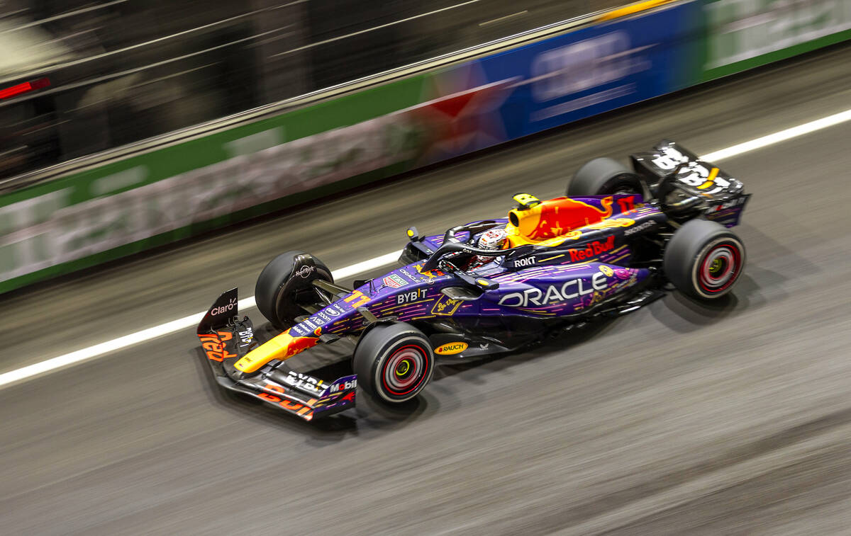 Red Bull Racing driver Sergio Perez speeds down the front straightaway during the Las Vegas Gra ...