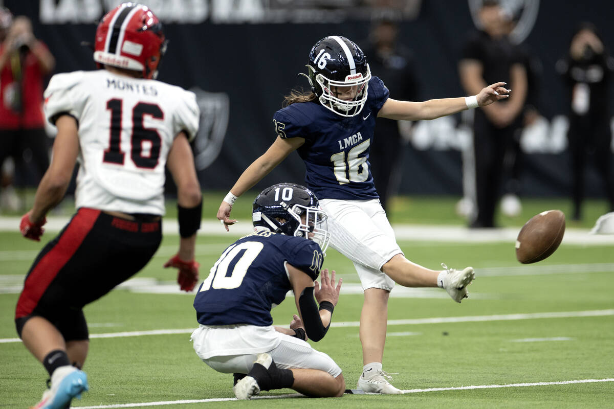 Lake Mead kicker Gracie Rhodes kicks to score an extra point during a Class 2A high school foot ...