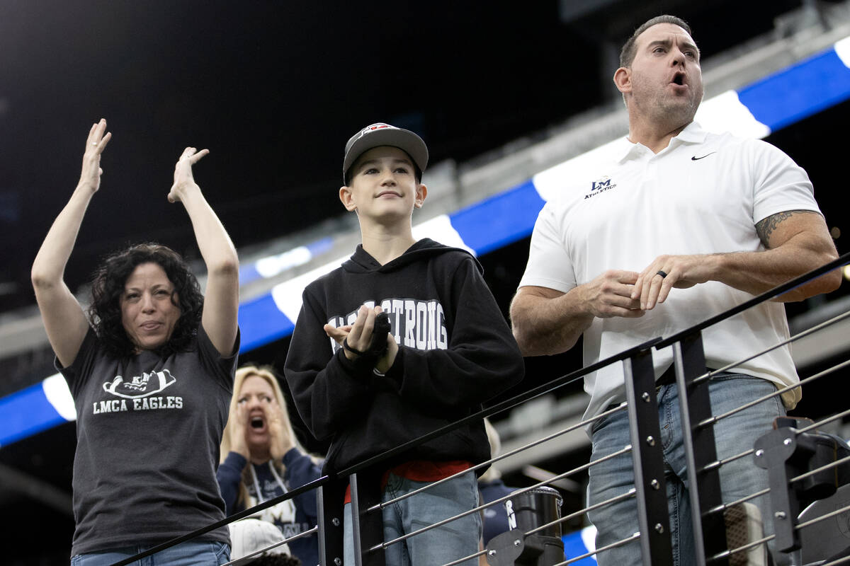 Lake Mead fans cheer for their team during a Class 2A high school football championship game ag ...