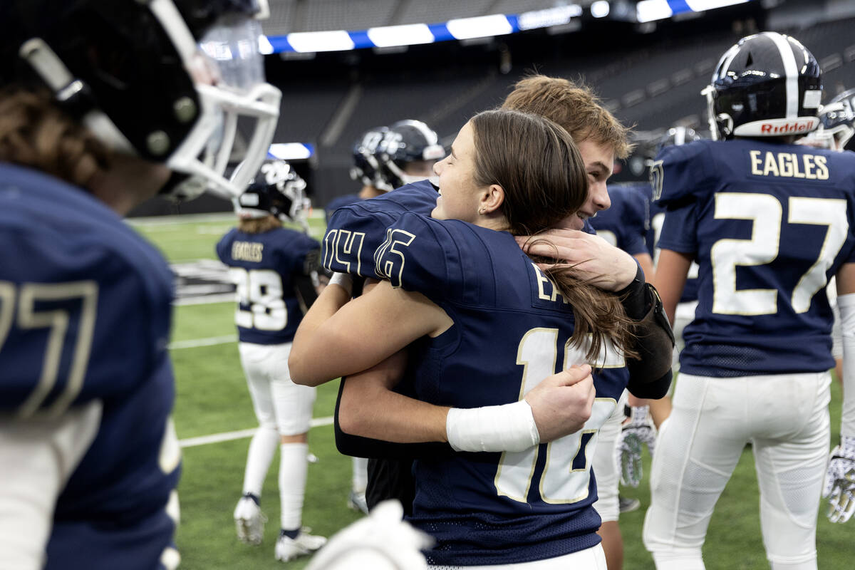Lake Mead siblings Gracie Rhodes (16) and Christian Rhodes (14) embrace after they won the Clas ...