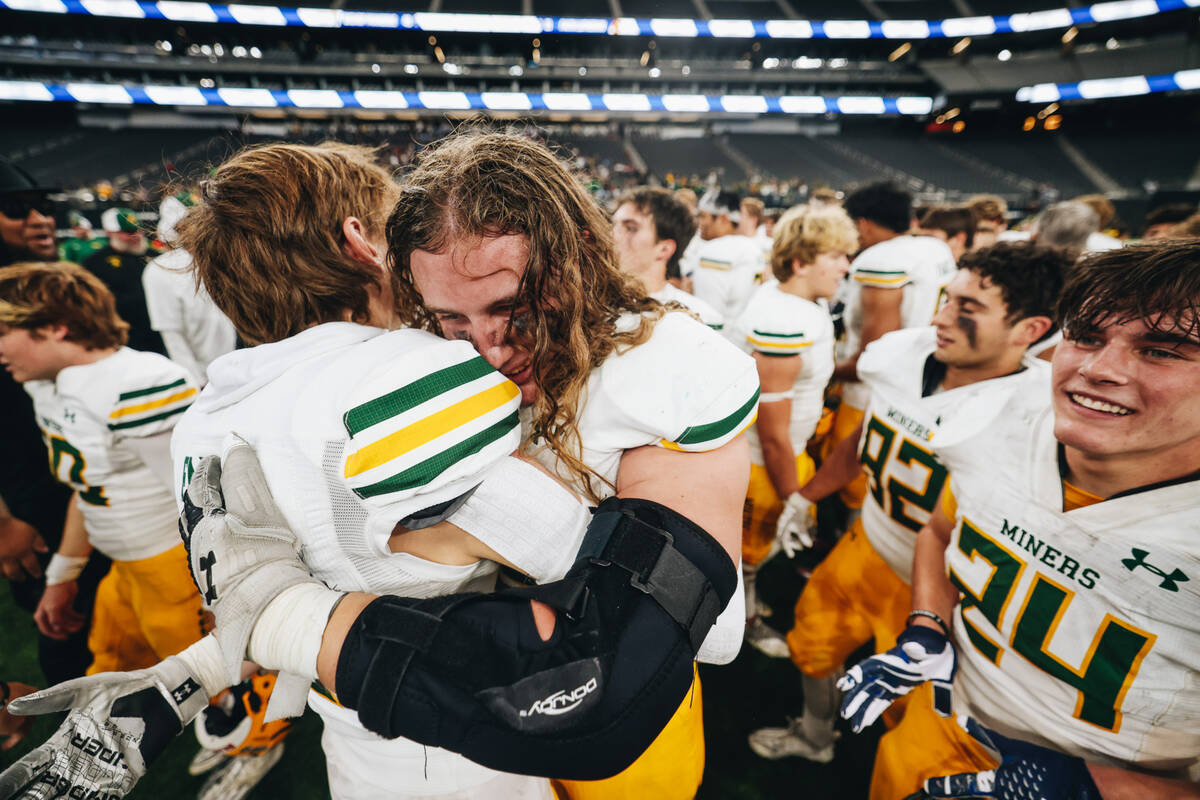 Bishop Manogue celebrates after winning a class 5A Division II state championship game against ...