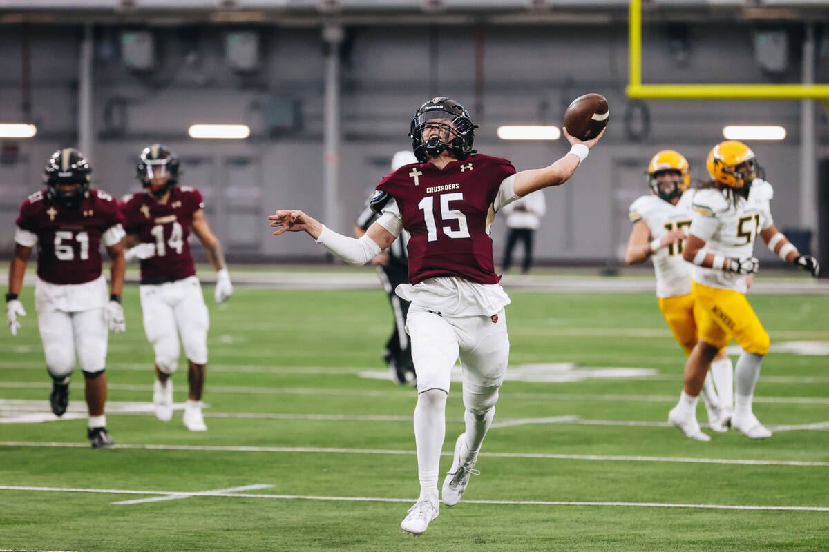 Faith lutheran quarterback Alex rogers throws the ball during a class 5A Division II state cham ...