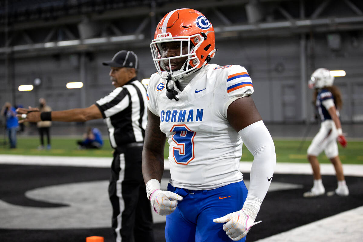 Bishop Gorman tight end Elija Lofton (9) celebrates his touchdown during the first half of a Cl ...