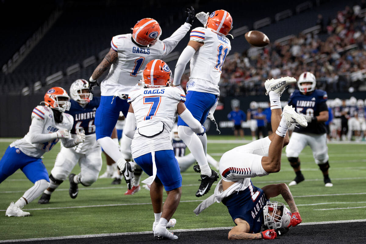 Bishop Gorman knocks away a touchdown pass intended for Liberty wide receiver Jayden Robertson ...