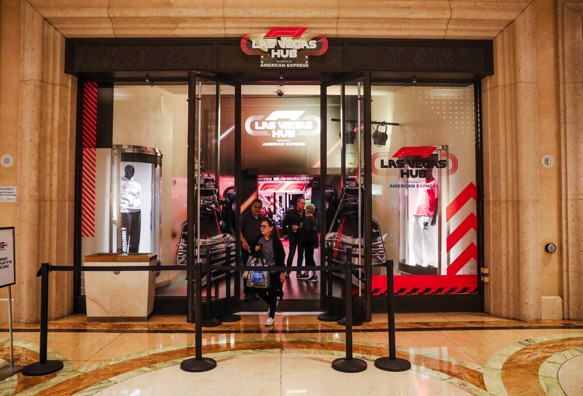 A pop-up retail outlet for Las Vegas Grand Prix merchandise near the waterfall atrium between T ...