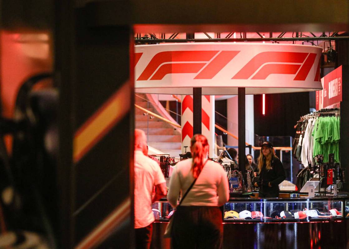 A pop-up retail outlet for Las Vegas Grand Prix merchandise near the waterfall atrium between T ...