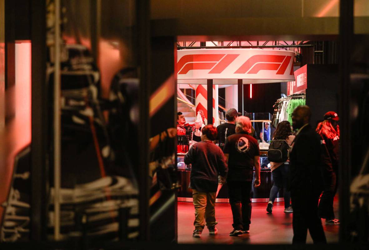 A pop-up retail outlet for Las Vegas Grand Prix merchandise near the waterfall atrium between T ...