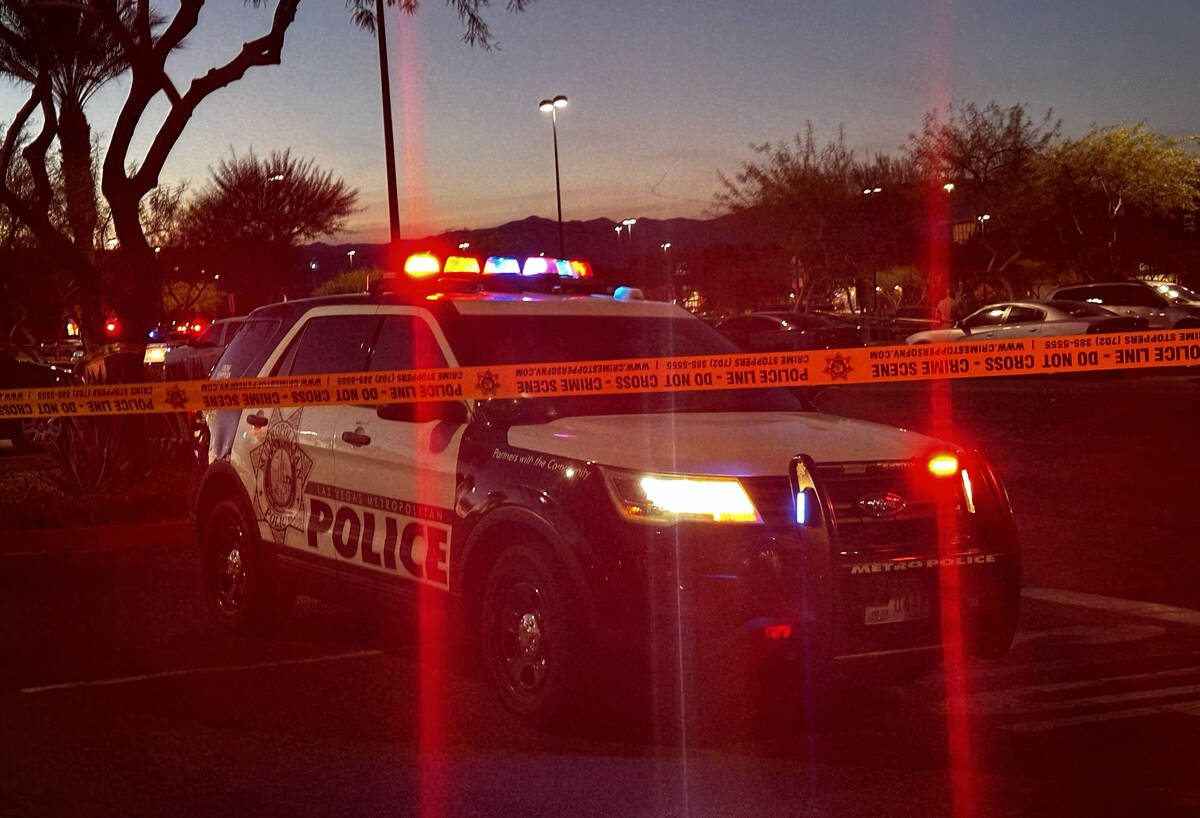 Police investigate a fatal shooting scene near Walmart at 7200 block of Arroyo Crossing Parkway ...