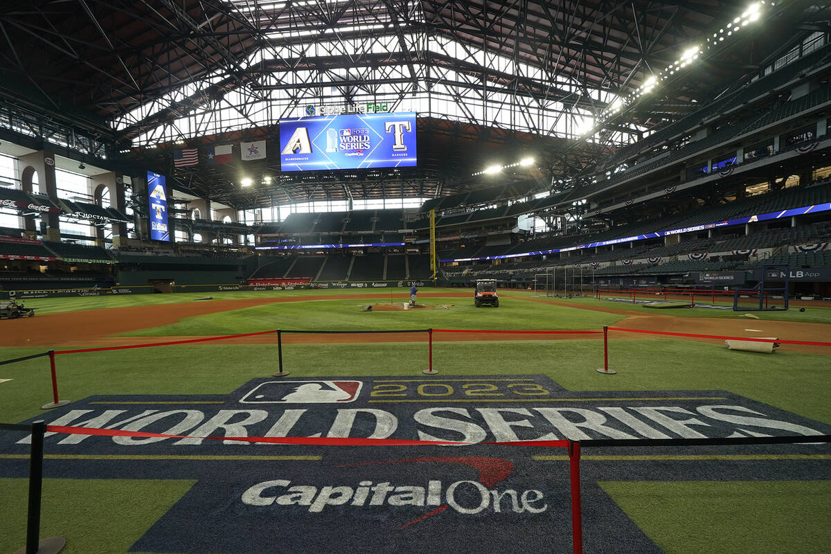 Signage is seen near the infield at Globe Life Field ahead of the World Series between the Texa ...