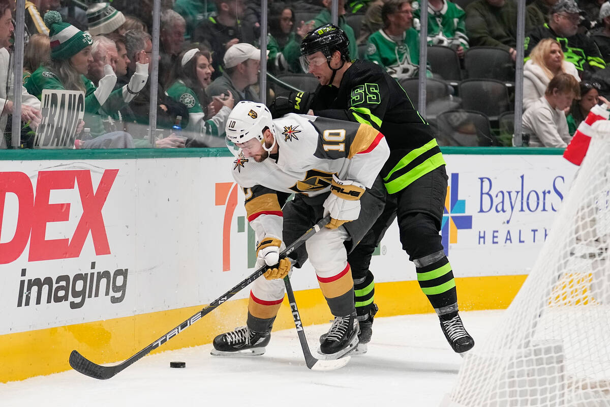 Vegas Golden Knights center Nicolas Roy (10) and Dallas Stars defenseman Thomas Harley (55) com ...