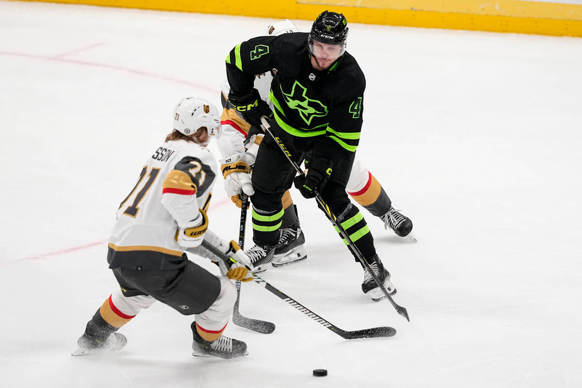 Dallas Stars defenseman Miro Heiskanen (4) competes for possession against Vegas Golden Knights ...