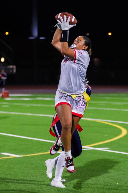 Liberty’s Lolo Westerlund (4) catches the ball during a flag football game between Coron ...