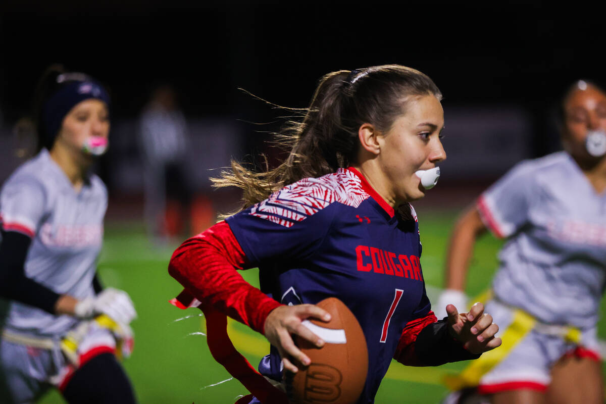 Coronado’s Maci Joncich (1) runs the ball down the field during a flag football game bet ...