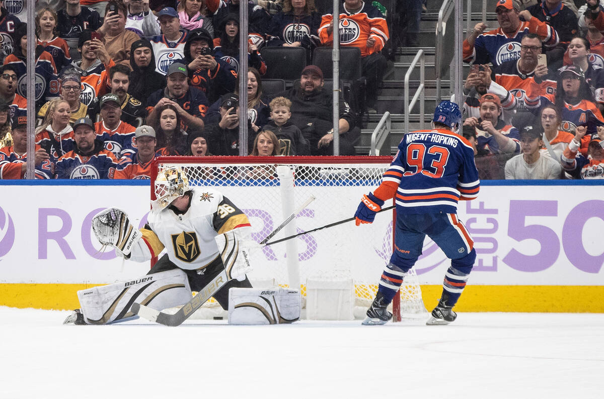 Vegas Golden Knights goalie Logan Thompson (36) is scored on by Edmonton Oilers' Ryan Nugent-Ho ...