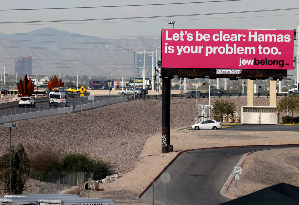 An anti-Hamas billboard sponsored by JewBelong, a nonprofit that fights antisemitism, greets mo ...