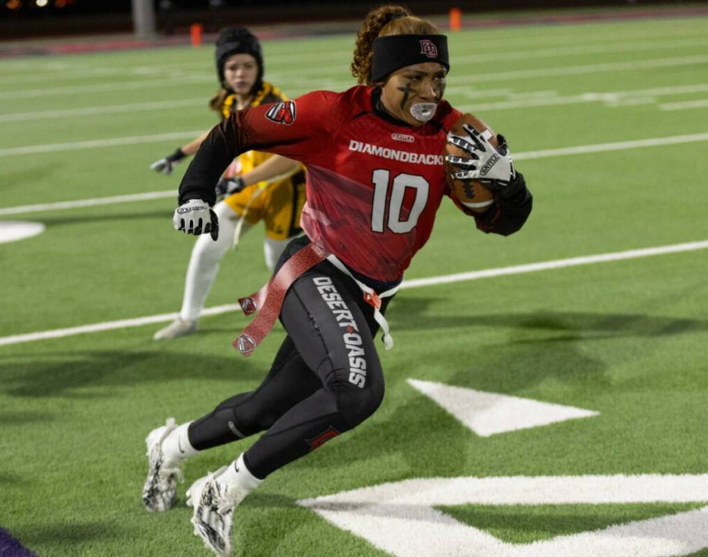 Desert Oasis wide receiver runs the ball during a high school flag football game against Bonanz ...